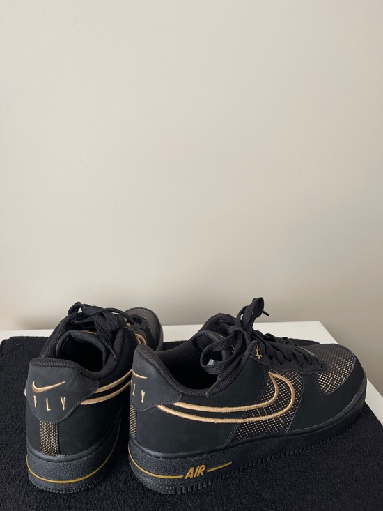 Nike Shoes - Nike Black and Gold Low-Top Sneakers